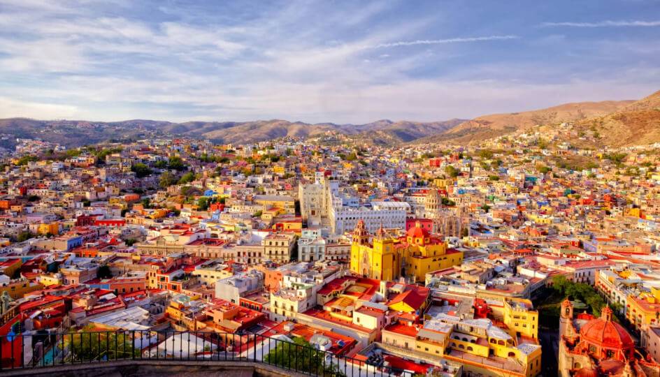 A panoramic view of San Miguel de Allende, Mexico, showcasing its colorful colonial buildings