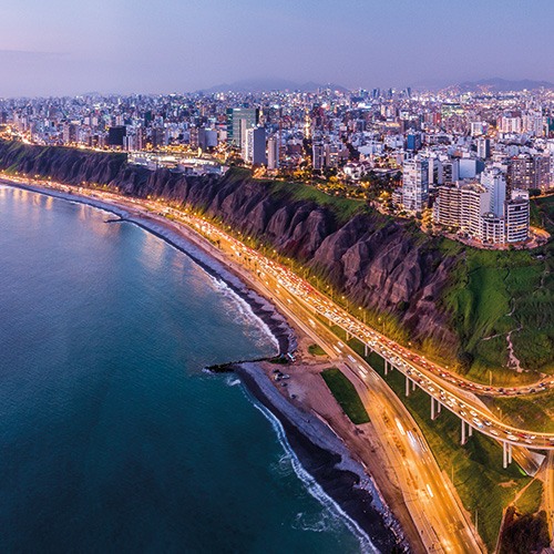 A stunning aerial shot of Lima Peru showcasing the Miraflores district and its coastline